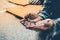 Male Beggar hands seeking money, coins from Human kindness on the floor at street walkway