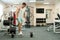 male bodybuilder athlete, trains in the gym, using sports equipment and fitness equipment to improving health and beauty of t