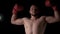 Male boxer poses and shows strength. Confidence, winner