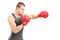 Male boxer punching with red boxing gloves