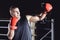 Male boxer taking a selfie on his smartphone after training.