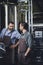 Male brewery workers in aprons