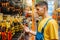 Male builder choosing pliers in hardware store