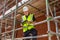 Male Builder Construction Worker Contractor on Building Site With Clipboard