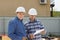 Male Building Engineers Visiting Construction Site