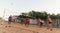 male Caucasians, Arabs, Africans playing volleyball on the beach