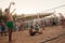 male Caucasians, Arabs, Africans playing volleyball on the beach