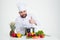 Male chef cook preparing food and showing thumb up