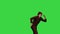 Male chef cook in red uniform break dancing with a spatula against green background on a Green Screen, Chroma Key.