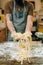 Male chef hands with uncooked homemade pasta