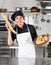 Male Chef Holding Bread Loaf