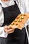 Male Chef Holding Tray With Stuffed Ravioli Pasta