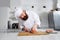 Male chef preparing gourmet meal of seafood in modern kitchen