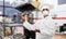 Male chef in respirator at kebab shop kitchen
