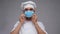 male chef in toque wearing medical mask