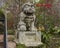 Male Chinese guardian Lion at the entrance to Dragon Park in the Oak Lawn neighborhood in Dallas, Texas.