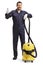 Male cleaner in a uniform with a professional vacuum cleaner showing thumbs up