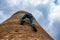 Male climber climbs the water tower