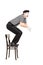 Male comedian jumping from a chair