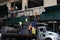 Male Construction Workers Putting Up Scaffolding on the Side of a Building in Midtown Manhattan of New York City