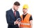 Male constructor and businessman browsing on cellphone
