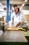 Male craftman is working with a planer bench