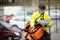 Male Cyclist With Package And Courier Bag On