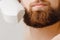 Male depilation laser hair removal beard and mustache procedure treatment in salon.