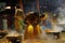 Male devotees perform holy bath ritual with hot turmeric water