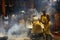 Male devotees perform holy bath ritual with hot turmeric water