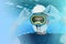 Male, disinfector in a protective suit, respirator, goggles and helmet, biological and chemical weapons concept, coronavirus,