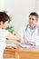 Male Doctor greeting a patient