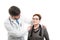 Male doctor holding shoulders to female senior patient