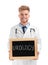 Male doctor holding small blackboard with word UROLOGY on background