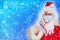 Male doctor, santa claus with a white beard, medical stethoscope, concept of christmas, waiting for gifts, preventive examination