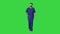 Male doctor surgeon talking while walking on a Green Screen, Chroma Key.