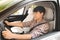 Male driver with fastened safety belt