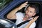 male driver making gesture disbelief