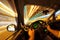 Male driver`s view while driving at night on street lighten up artificially. Fisheye lens and long exposure creates beautiful