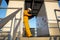 Male Electricity Engineer inspect and maintenance electric power system in generator at industrial plant. Technician  writing,