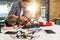 Male electronic engineer with european school children working in smart school lab and testing model of radio controlled