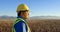 Male engineer standing in the wind farm 4k