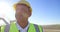 Male engineer standing in the wind farm 4k