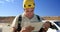 Male engineer writing on clipboard in the wind farm 4k