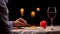 Male enjoying gourmet dinner in restaurant, eating pasta and drinking wine