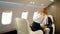 Male and female business lawyer partners talk and working in private jet. chief