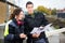 Male And Female Carpenters Discussing About Plan