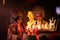 Male and female Chinese opera actors Light a candle to pray homage to the gods to enhance the prosperity for yourself on the