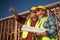 Male and Female Construction Workers at Construction Site