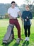 Male and female golfers ready for team play at golf course